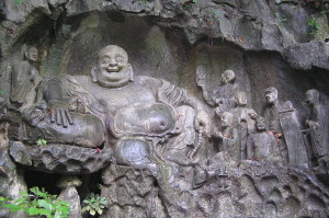 Maitreya_and_disciples_carving_in_Feilai_Feng_Caves